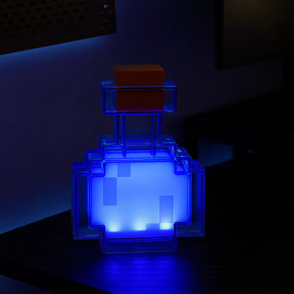 Lampe potion Minecraft lumineuse LED multicolore. Parfaite pour une déco gaming unique, disponible chez SmartMagnet.